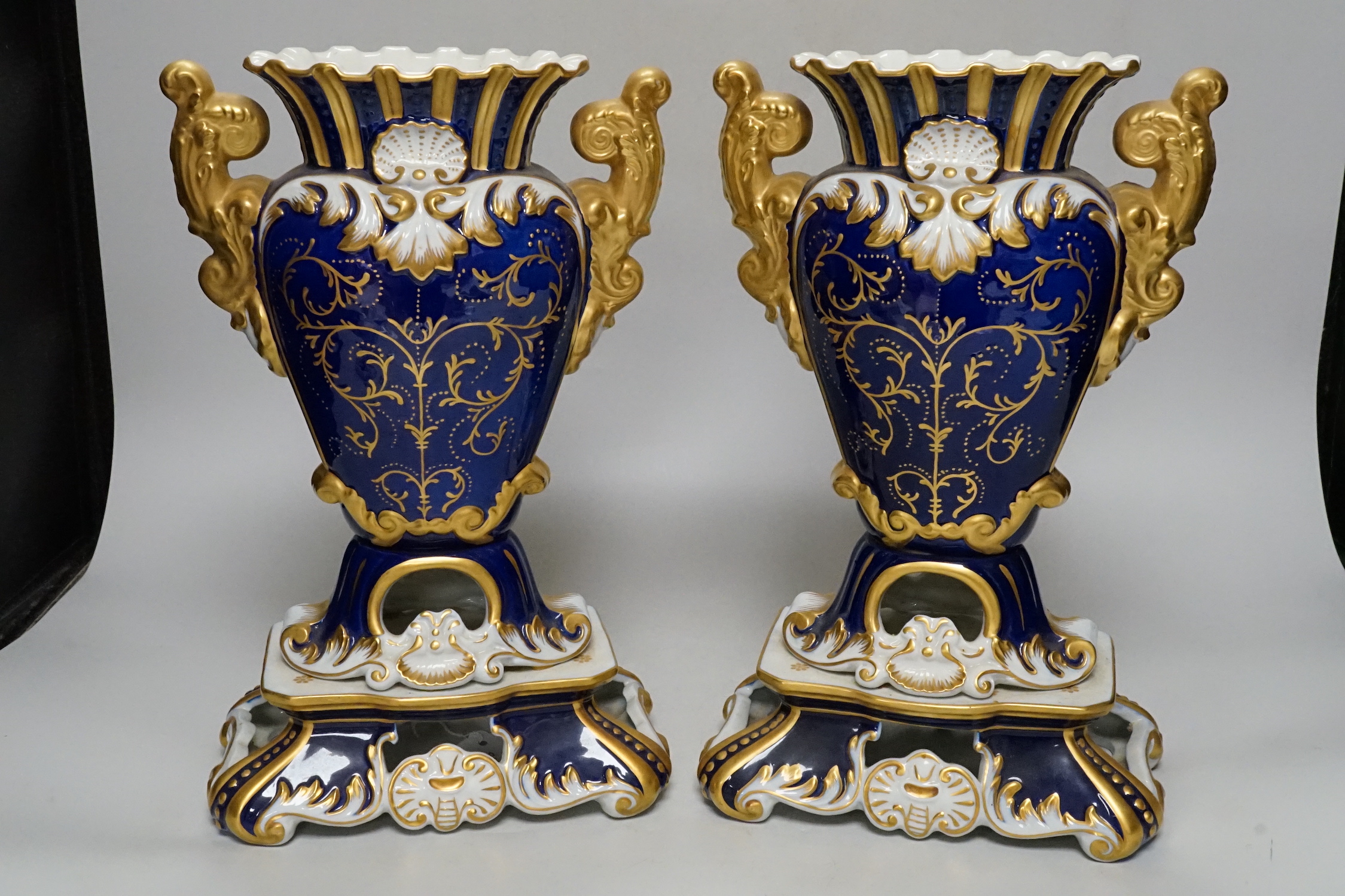 A pair of Sevres style porcelain vases, 31.5cm